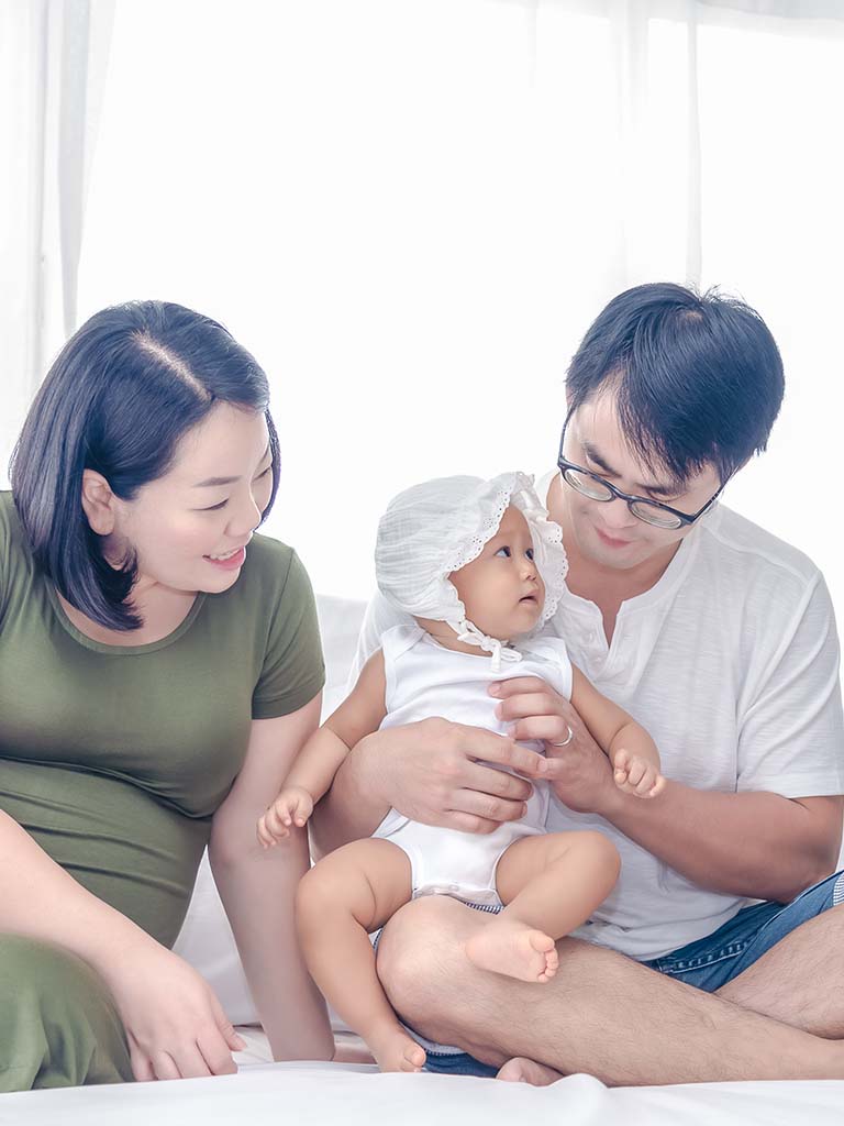 Couple in Oahu with a new baby. Stress counseling for new parent phase of life, Honolulu, Hawaii.