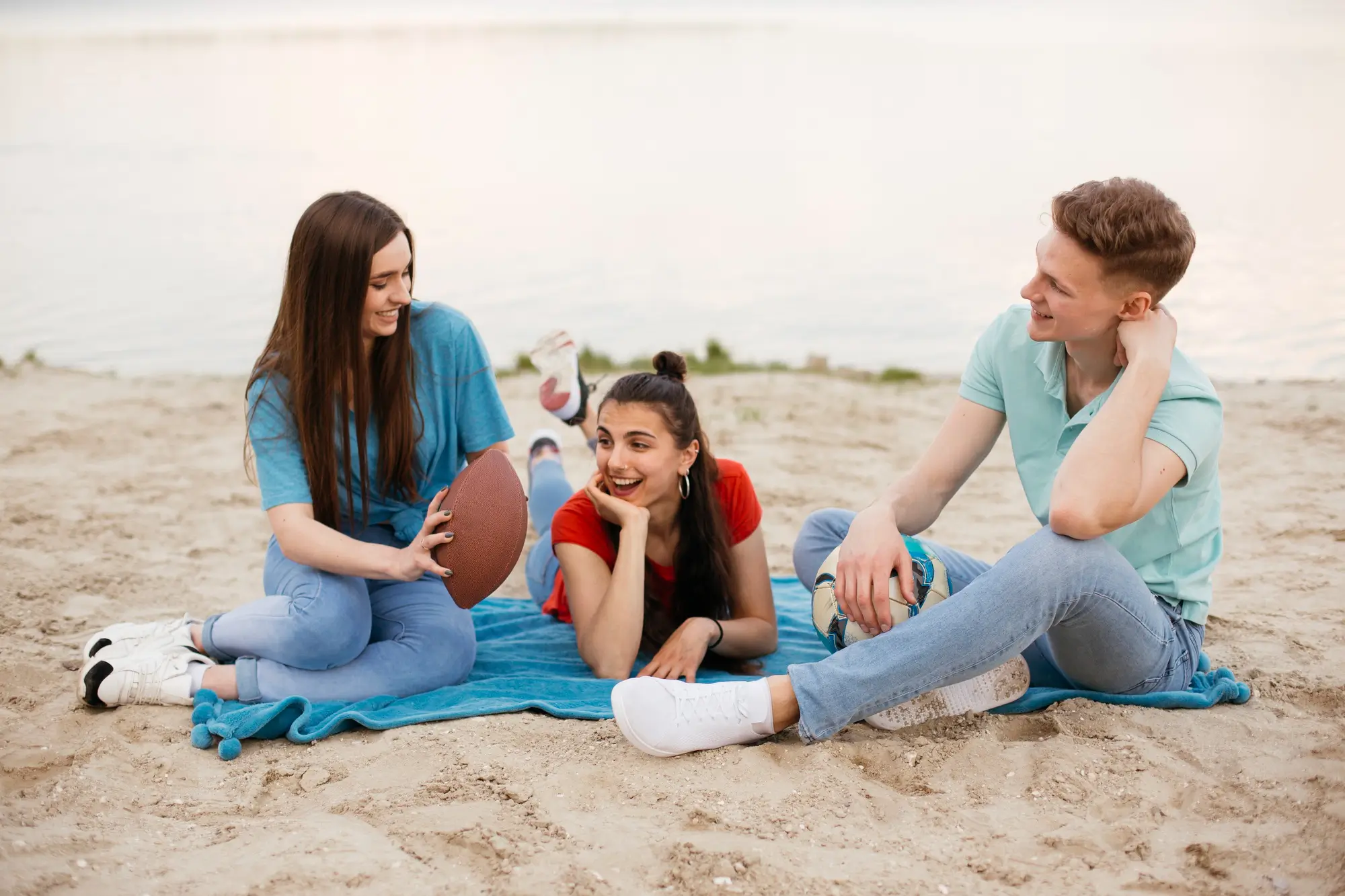Family enjoying sunset on Oahu beach without phones promoting digital well-being and aloha lifestyle. Tech-free spaces and activities for families in Hawaii.